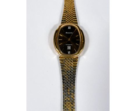 BULOVA: a vintage gold plated automatic watch with brown dial, gold hands, seconds sweep and baton markers, date aperture, on