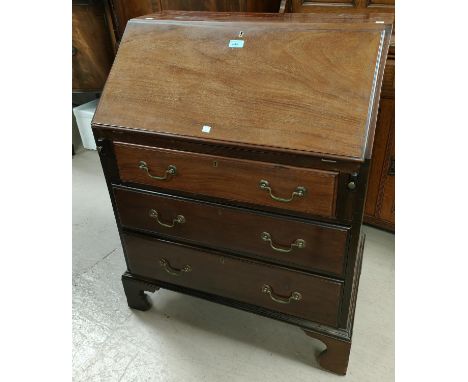 A mahogany fall front bureau with 3 drawers under on bracket feet 