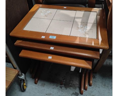A nest of three 1970's tile top occasional tables. 