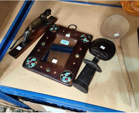 An Arts &amp; Crafts wall mirror with coloured jewelled enamel mounts, overall size 27 x 22cm; An unusual large carved wooden
