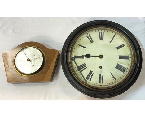 A late 19th/early 20th century wall clock with circular dial; a barometer 