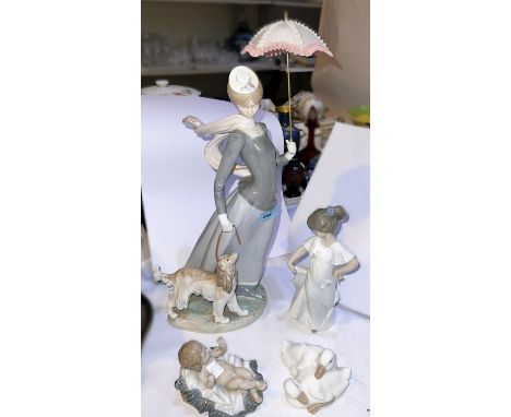 A large Lladro group:&nbsp; young lady with dog and parasol (parasol slight a.f.); a Lladro bay; 2 pieces of Nao 
