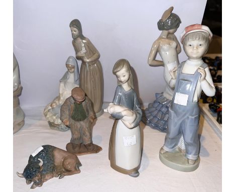 Two Lladro figures and a sleeping bull; 2 Nao figures and a terracotta figure&nbsp; 