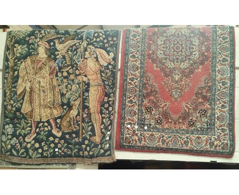 A small hand knotted Persian rug; a Persian pattern rug; a wall hanging tapestry panel.
