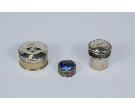 A miniature box in white metal and enamel;a cylindrical hallmarked silver pill box and a silver plated box (a.f) 