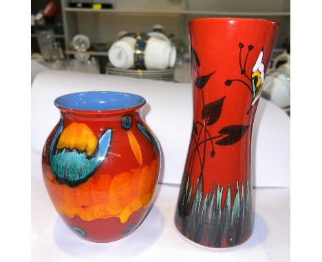 A 1970's Poole vase of cylindrical waisted form by Andrew Tanner, height 25cm; and a Poole baluster vase, height 17cm 