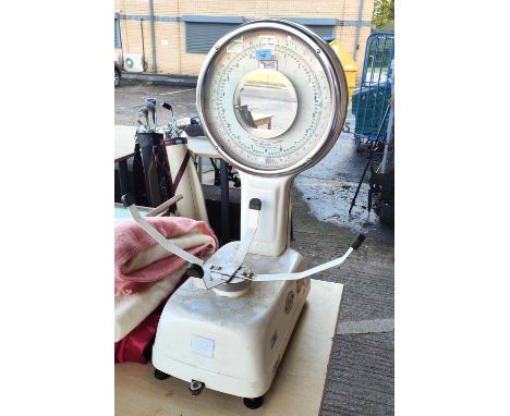 A mid 20th century set of baby scales by Autoweight; a portfolio of prints and another 