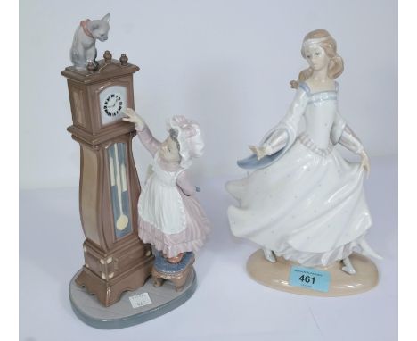 A Lladro group:&nbsp; girl with grandfather clock, height 28cm; another:&nbsp; dancing girl (1 hand a.f.) 