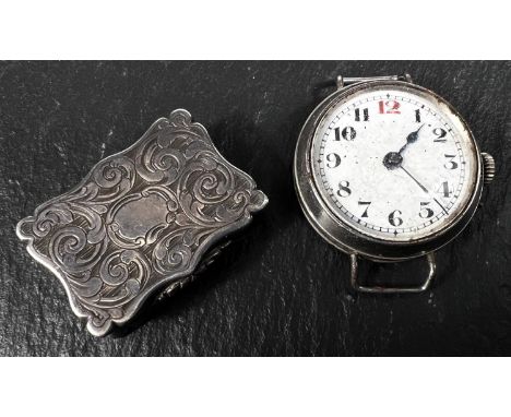 A hallmarked silver Victorian vinaigrette (internals missing), scrolling decoration to outside, Birmingham 1843 maker E.S and