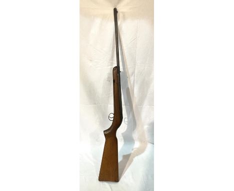 A vintage air rifle, wooden stack, stamped 2030002 