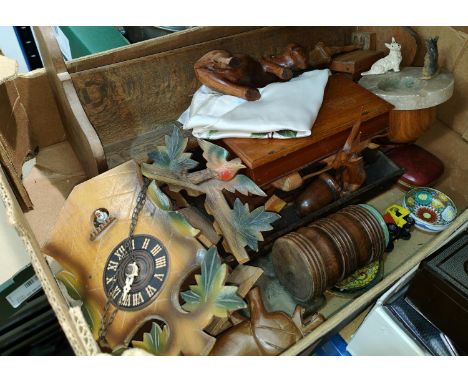 A selection of carved treen; a cuckoo clock; etc. 
