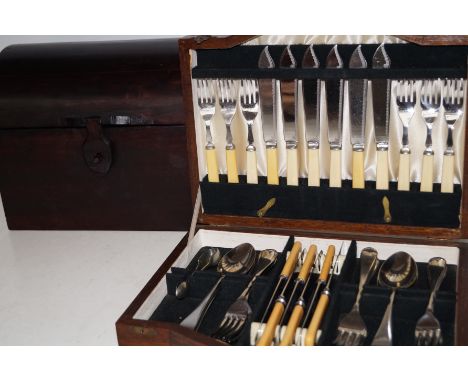 Domed two compartment caddy together with a canteen of cutlery in oak case