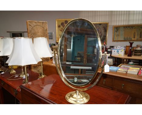 Brass toilet mirror