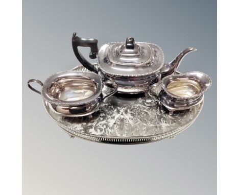 A three piece Viners plated tea service on gallery tray (4)