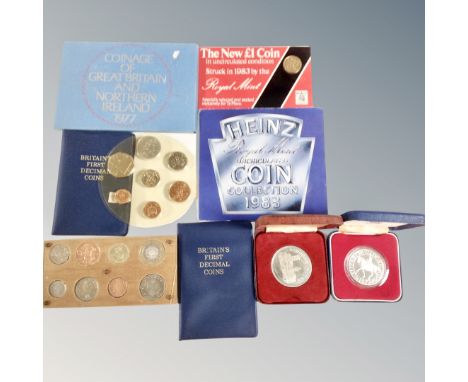 A box of coin sets, coins of Great Britain 1977, Heinz Royal Mint coin collection 1983, Britain's First decimal coin set, 197