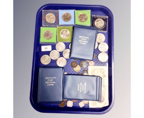 A collection of coins, Britain's First Decimal coins, one pound note, commemorative coins, antique and later coins.