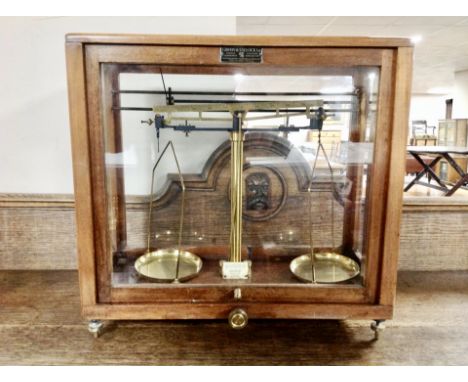 A set of chemist's scales in case by Griffon and Tatlock ltd 