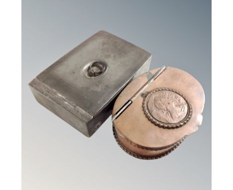 A 19th century brass snuff box with inset coin together with further pewter snuff box 