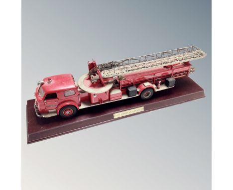 A Franklin Mint 1954 American La France fire engine on plinth 