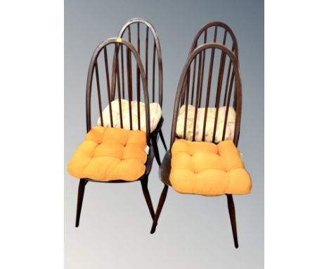 A set four Ercol elm and beach high backed dining chairs in antique finish 