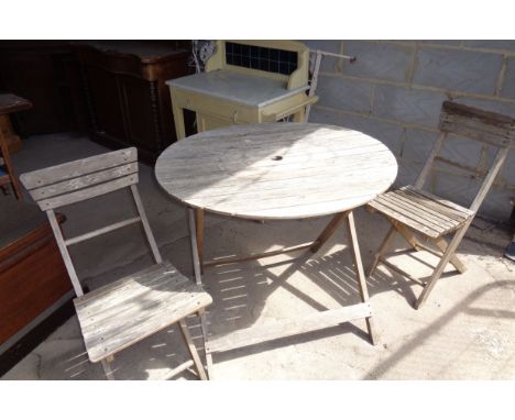 Wooden circular folding garden table and two folding chairs