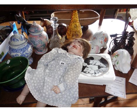 Contemporary porcelain headed doll with cheeky expression, a Danbury Mint Laurel &amp; Hardy plate, and other china and glass