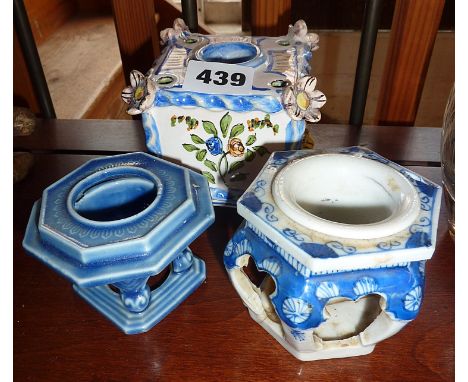 Chinese blue and white inkwell, another similar and a tin glazed Continental inkstand with floral decoration
