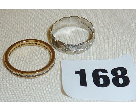 Two 18ct gold rings, one yellow gold, set with 1ct of diamonds, approx size 'R' and the other white gold with a modernist sty