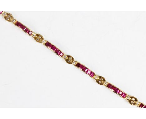 A ruby and diamond 18ct gold line bracelet, comprising eight panels each set with five square step cut rubies, interspersed b