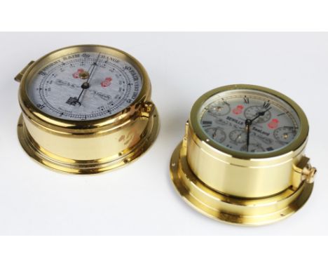 A Sewills 'Sealord' reproduction brass cased ships clock, the 11cm silvered dial with six subsidiary dials and quartz movemen