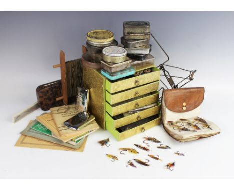 An assorted collection of vintage fly fishing flies and fly tying equipment, lead weights, to assorted tins and boxes and a q