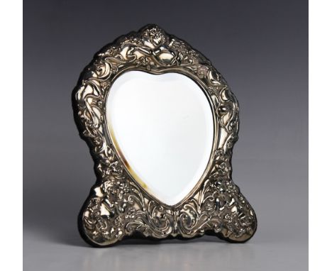 A Victorian style silver mounted easel mirror by Carr's of Sheffield, 1995, the heart shaped glass with a silver mounted surr