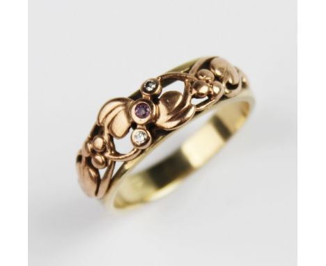 A Clogau 9ct gold gold 'Tree of Life' ring, the front section decorated with applied rose gold scrolling vines set with pink 