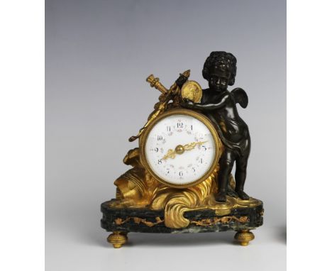 A late 19th century French gilt metal and spelter figural timepiece, the 6cm white enamel dial applied with Arabic numerals, 