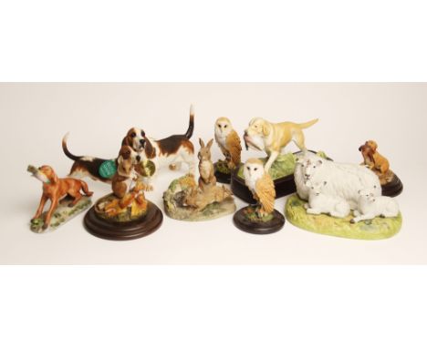 A Royal Worcester Sporting Dogs Series, Yellow Labrador, modelled by Doris Lindner, with duck in mouth, on stand, 19cm long o
