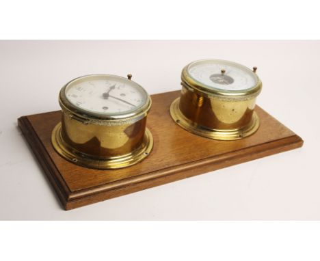 A Schatz Royal Mariner reproduction brass cased ships clock, with a two-train alarm movement, 16cm diameter, along with a bra