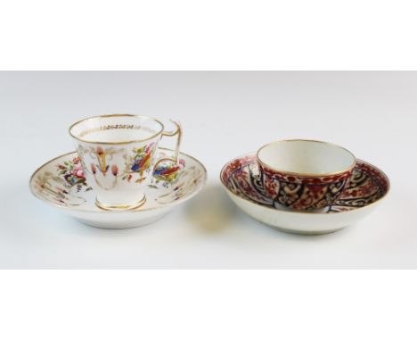 A Worcester porcelain tea bowl and saucer, circa 1775, decorated in the Queen Charlotte pattern, underglaze blue painted cres