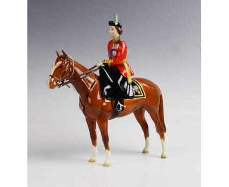 A Beswick model of H.M Queen Elizabeth II mounted on Imperial at Trooping The Colour 1957, model No. 1546, 27cm high For cond