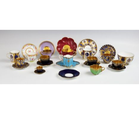 A quantity of Coalport cabinet cups and saucers, to include jewelled examples, a quatrefoil shaped example with turquoise gro