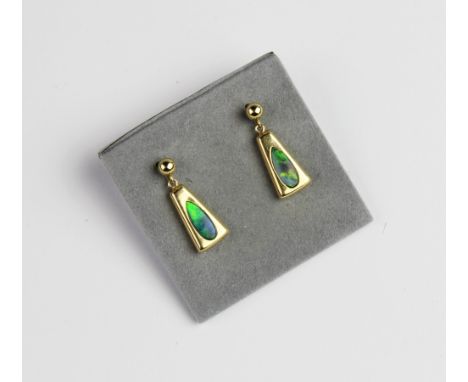 A pair of 14ct gold opal set drop earrings, each designed as a tapered panel set with a teardrop shaped opal doublet, with po