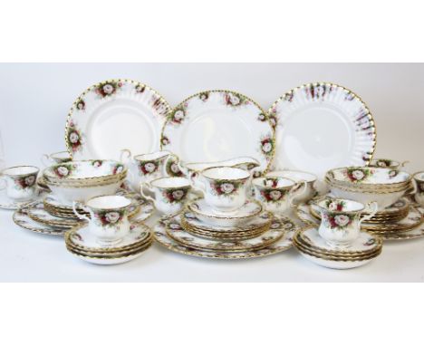 A Royal Albert part service in the 'Celebration' pattern, comprising: six dinner plates, six salad plates, twelve side plates