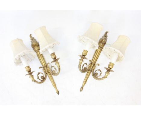 A pair of two branch wall lights, each designed as a flaming torch, 46cm H (2) Lighting lots are sold as decorative items onl