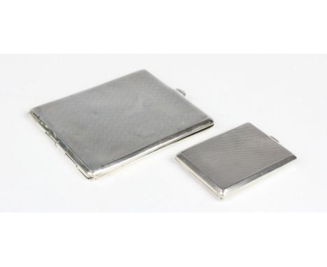 An Art Deco silver vesta case by Asprey & Co, London 1938, of rectangular form with canted corners and engine turned decorati