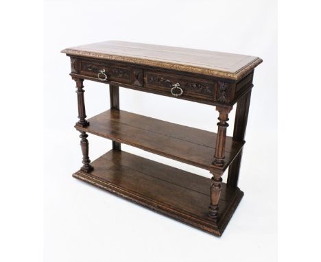 A Victorian oak and marble top buffet, the rectangular hinged top with a carved border enclosing a white marble slab top, abo