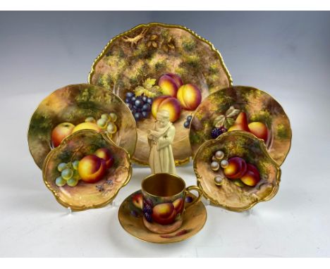 A collection of Royal Worcester, to include a plate, painted with peaches and grapes upon a mossy ground, signed 'Freeman', 2