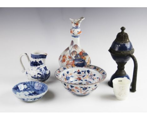 A selection of 18th century Chinese porcelain, to include an archaic mounted powder blue handled cup and cover, 23cm high, a 