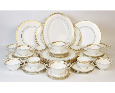 A Wedgwood part service in the 'Whitehall' pattern, comprising: eleven dinner plates, twelve salad plates, twelve desert plat