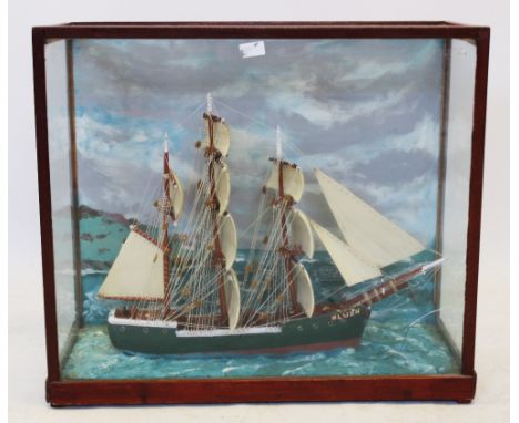 A cased handmade scratch-built model of a three masted tall ship named 'Olwen', 20th century, the rigged ship modelled in ful