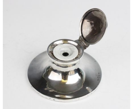 An Edwardian Scottish sterling silver mounted capstan inkwell, Brook & Son, Edinburgh 1907, of plain polished circular form o