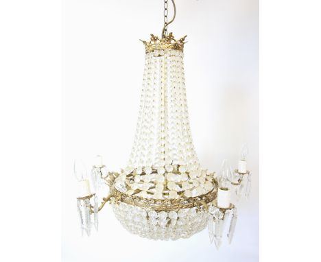 A gilt metal and glass droplet bell shaped pendant light fitting, mid 20th century, the lines of glass droplets extending to 